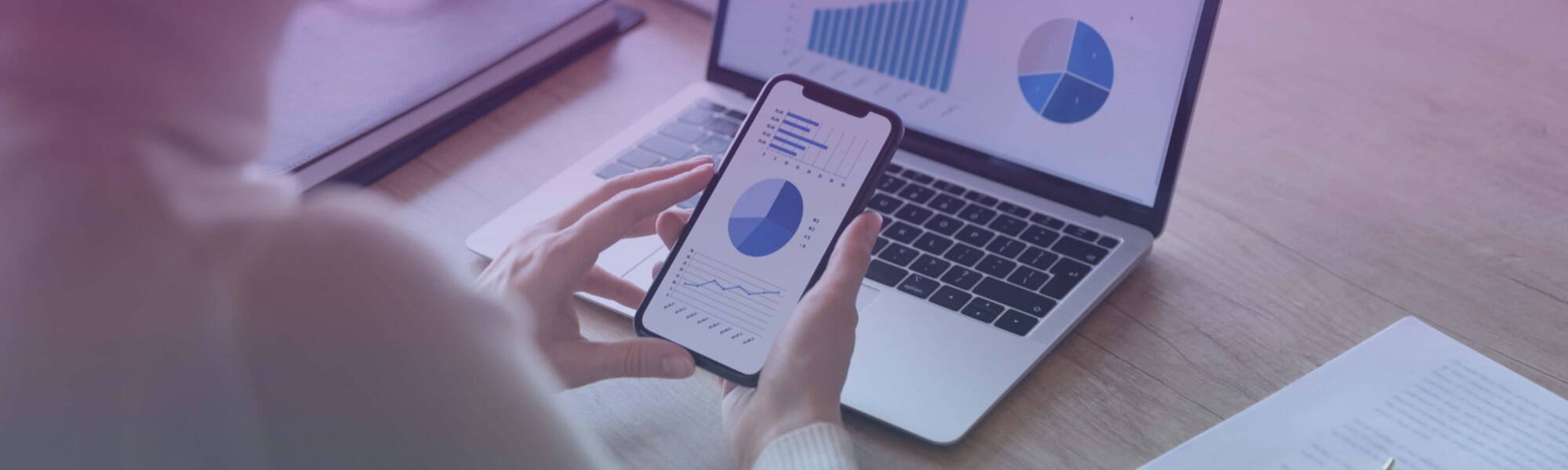 Woman looking at Sales statistics on phone