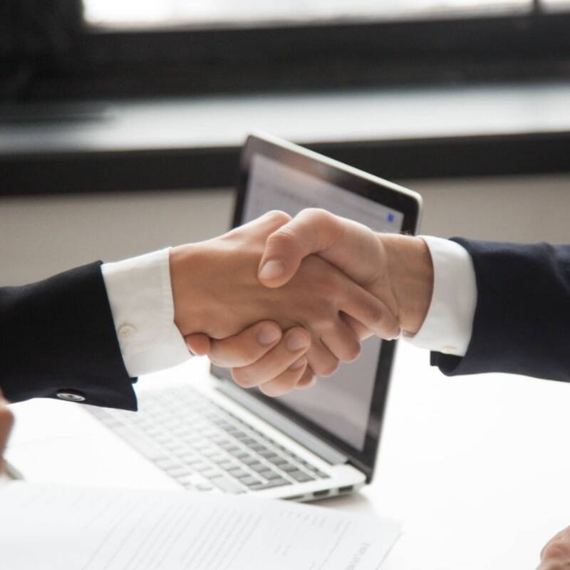 Two people shaking hands